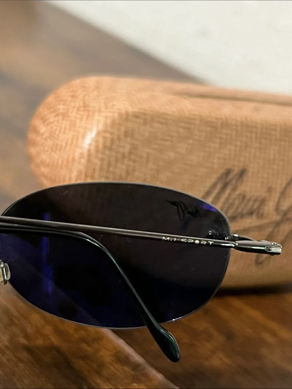 Maui Jim look small dark